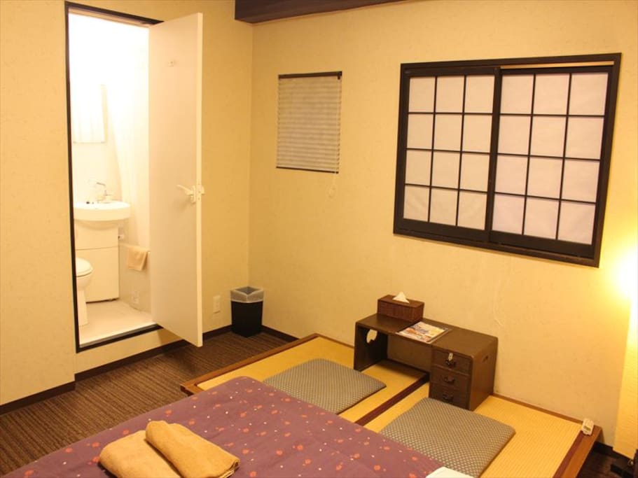 Room has a private bath and toilet.