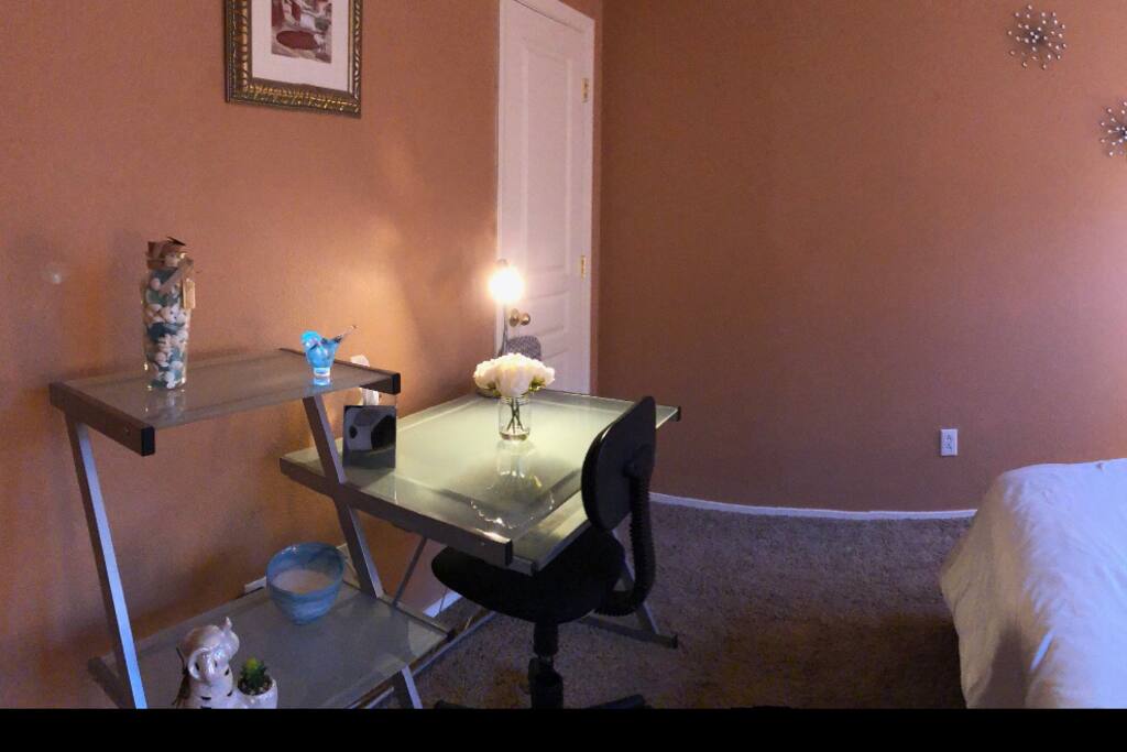 Dedicated work space, iron, ironing board walk in closet