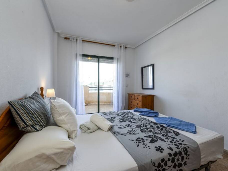 Double Bedroom with doors opening onto the balcony