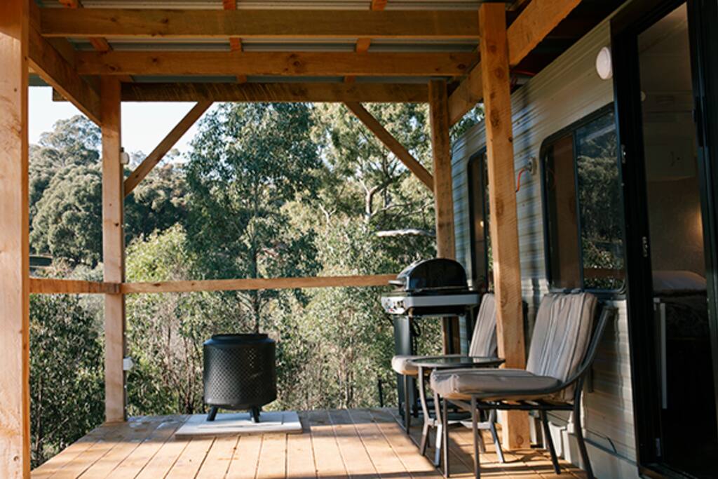 The deck, with a bbq and brazier