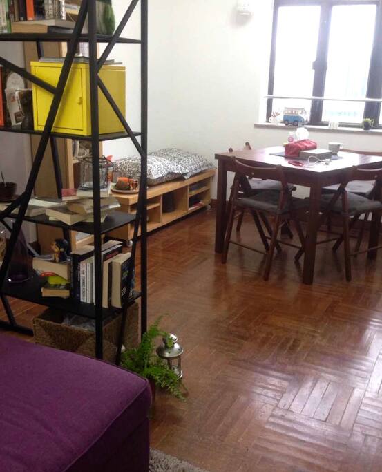 Adjustable dining table by the window. Bright and warm!