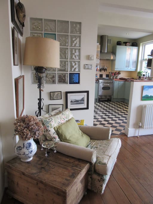 Cosy corner of dining room thro to the kitchen.