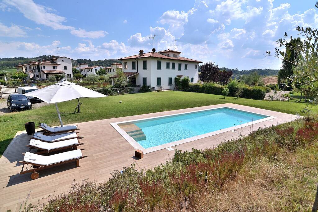 The house where we live. Our pool which is at your disposal. Your apartment is under the ground floor but very bright and airy!