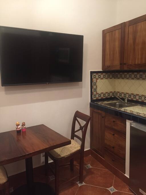 Flat screen tv with apple tv.