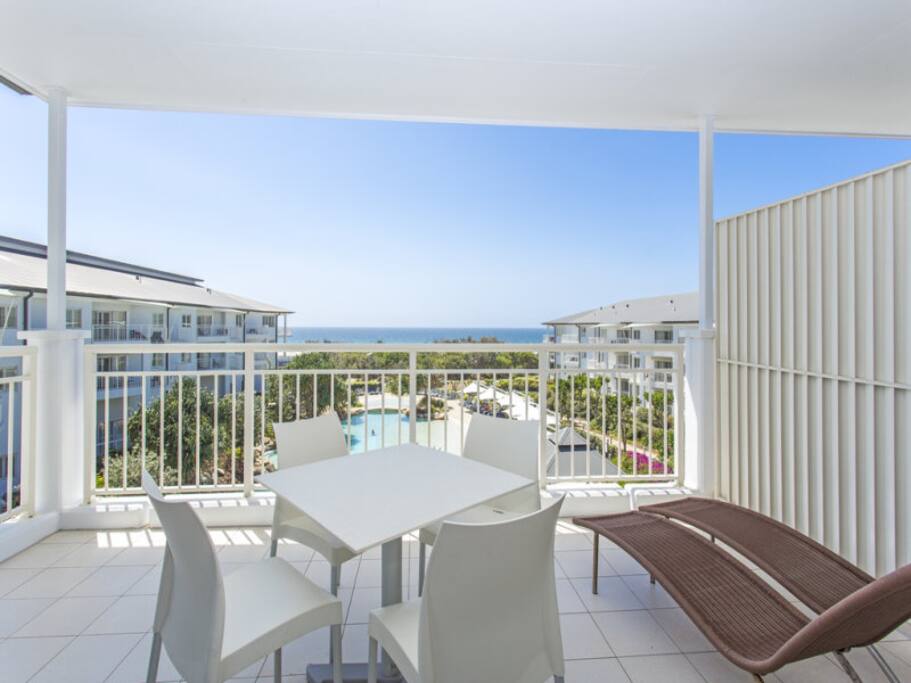 outdoor dining and sun lounges