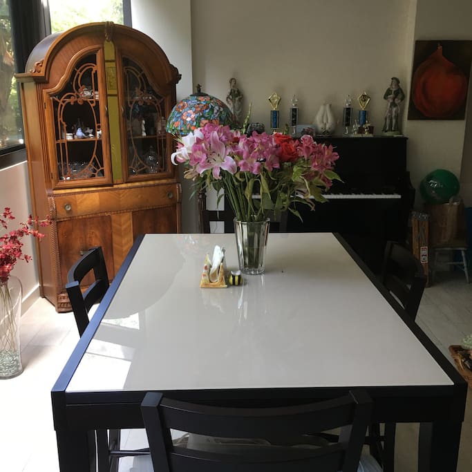 Dining area with windows and balcony