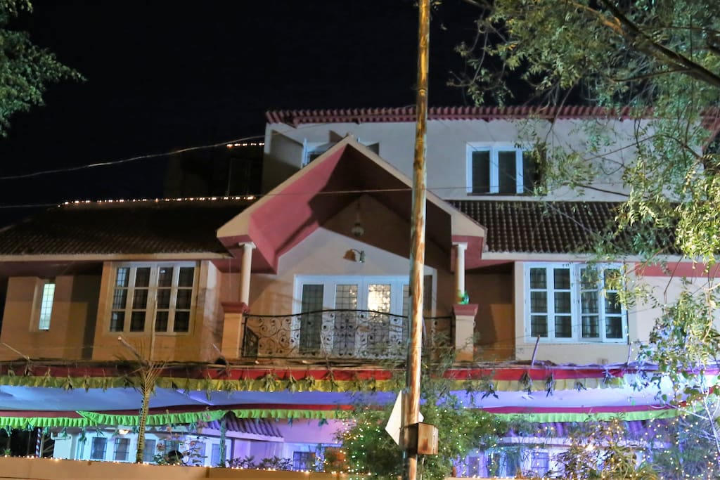 Fiesta Villa, illuminated and decorated with a traditional pandal for a pellikuturu function.