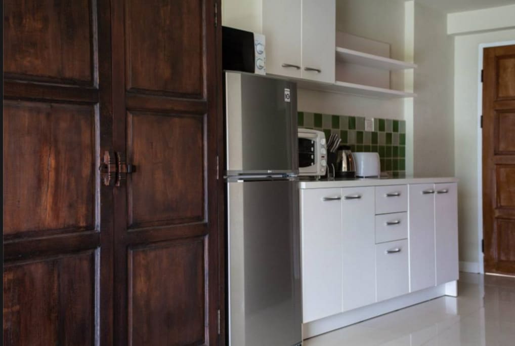 Spacious Kitchen area with all mod-cons: Fridge-Freezer, toaster-oven, microwave etc