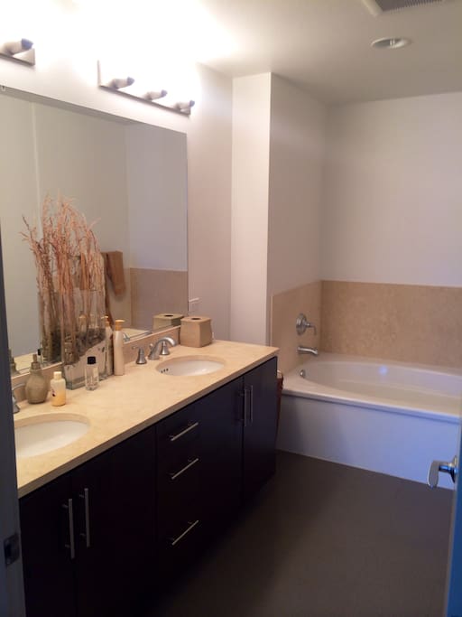 En suite bathroom w/ double sinks.