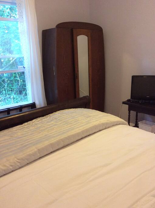 Guest Bedroom Armoir and woodsy view