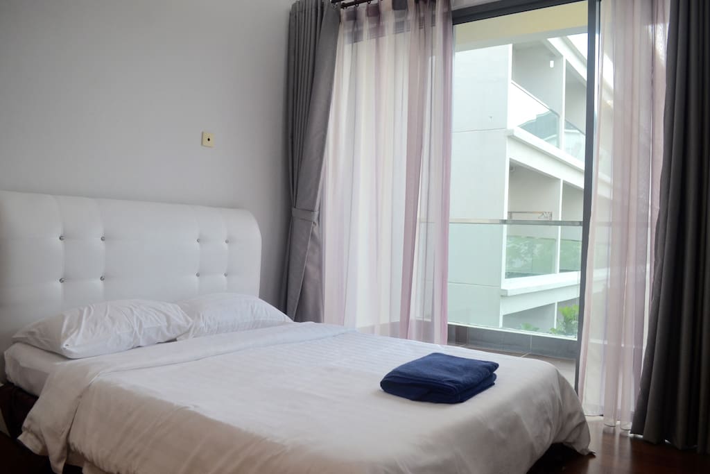 Master bedroom with balcony view