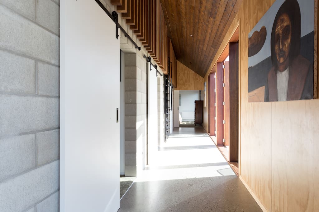 Hallway to bedrooms/Loft above