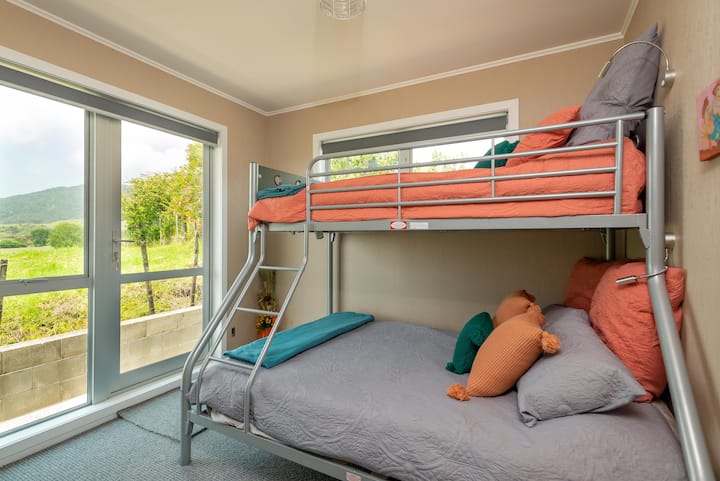 Upstairs Triple bedroom with double-single Bunk bed, and own exterior door.