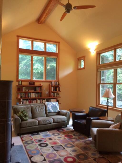 Large open living room with wood-burning stove