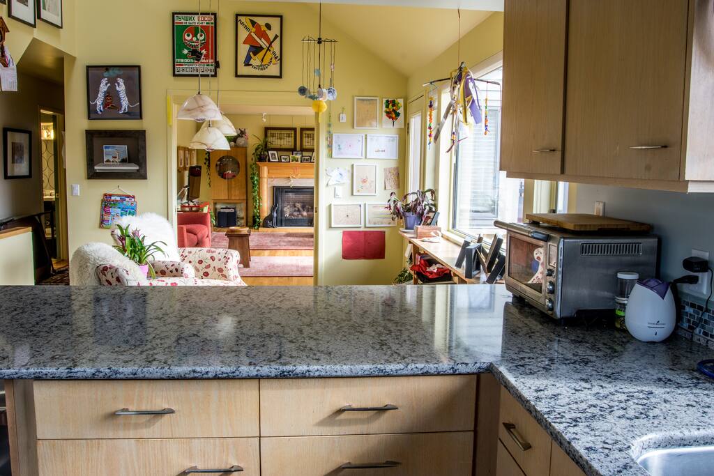View from the kitchen through the sitting area to the family room