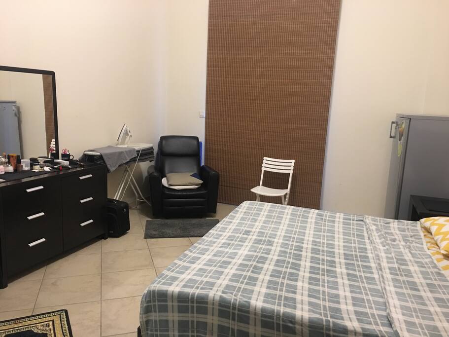 In-room ironing stand, a dressing table and an easy chair to relax.
The room also has a nice balcony; maybe have a cup of coffee in the morning.