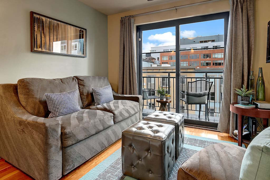 Sleeper sofa folds out to a tempurpedic, queen-sized bed.