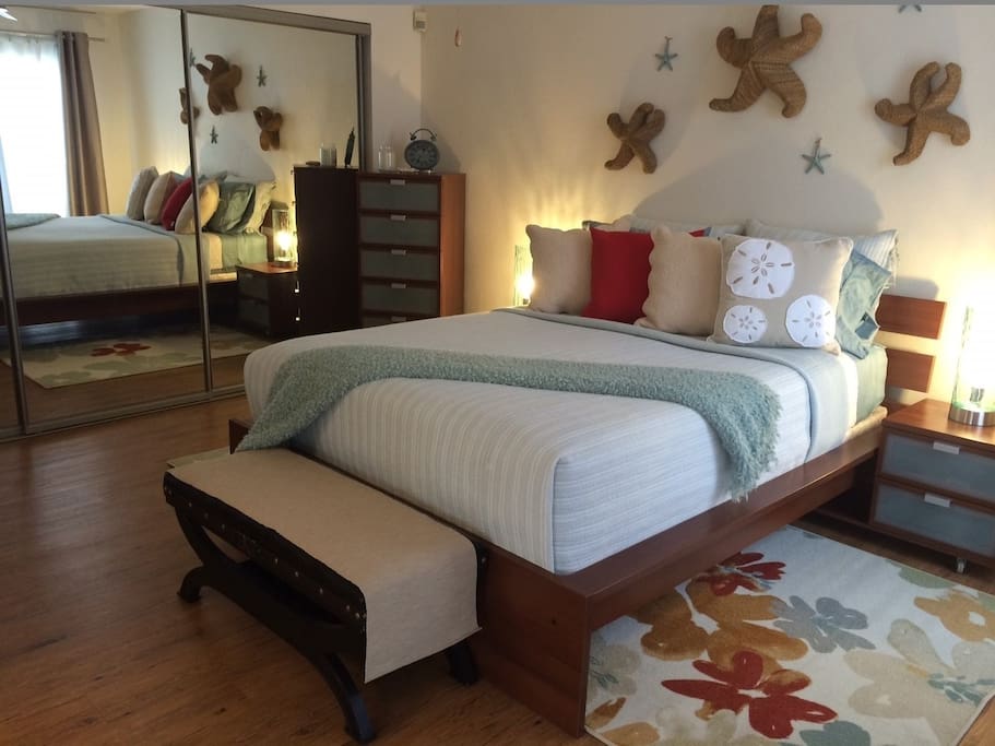 Fresh & clean linens, large mirrored wardrobe doors & hangers in closet, 2 chest of drawers, 2 night stands, Bose Sound System and sliding glass door to patio