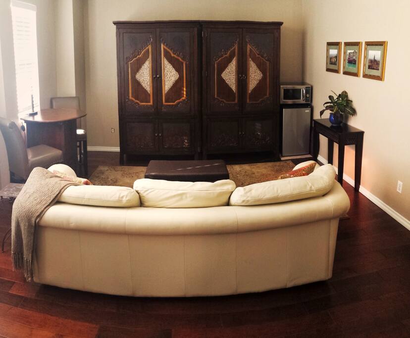 Stylish suite has sitting area with leather sofa, pub table & chairs, ample closets, TV/Netflix/Wifi, mini-fridge/micro and dishes. Coffee, tea, and biscuits are to enjoy at leisure.