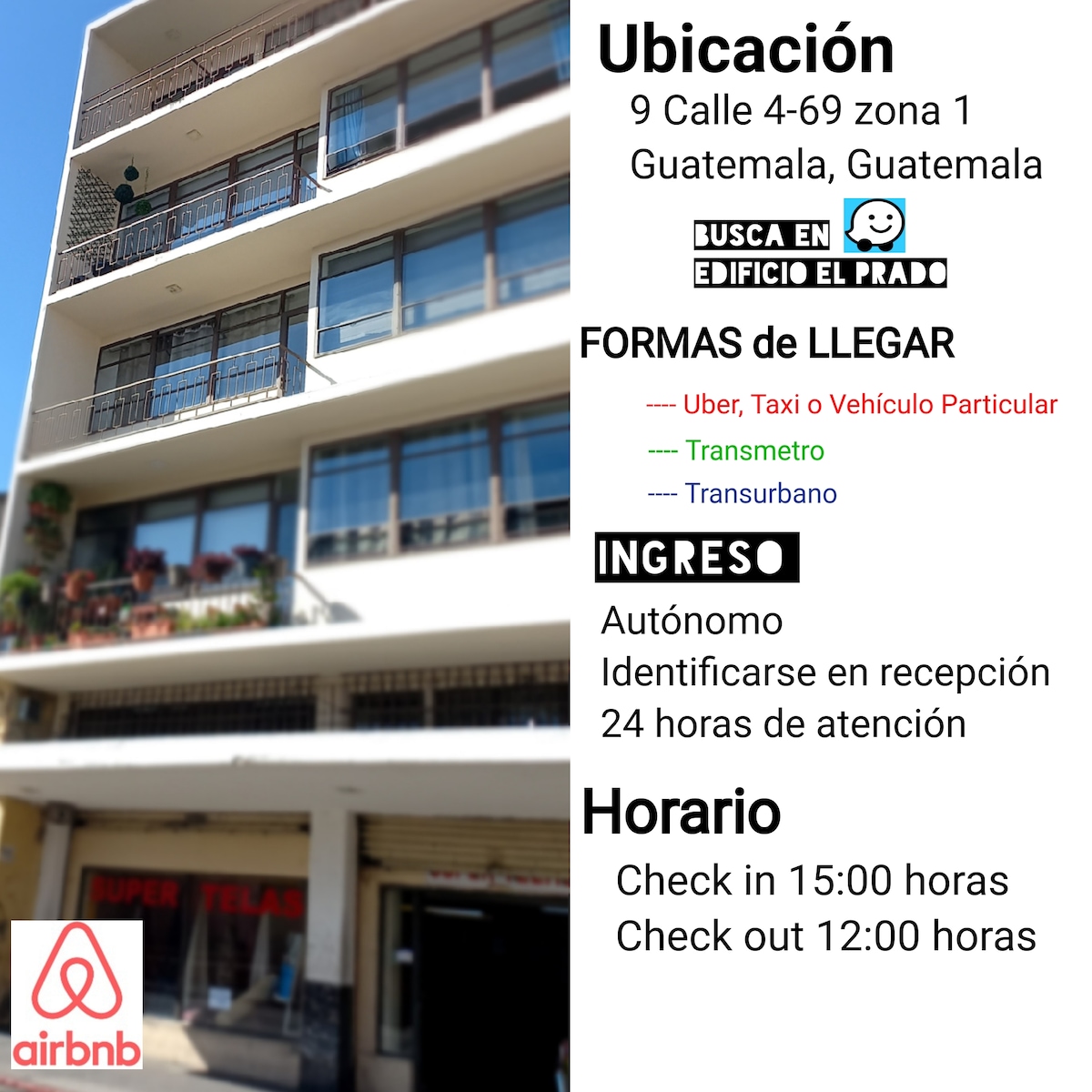 The image shows a modern building with a light-colored facade and multiple balconies. The entrance is marked with clear signage indicating the location and available transportation options. A well-maintained exterior is visible, with steps leading up to the entrance, reflecting the building's accessibility.