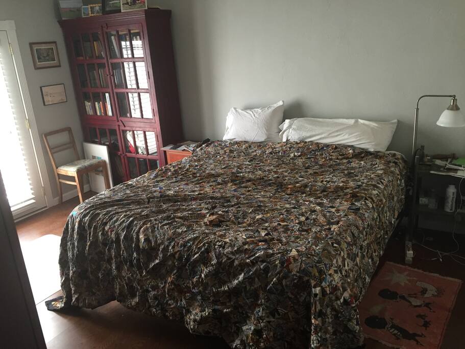 Quiet master bedroom with french doors and screen