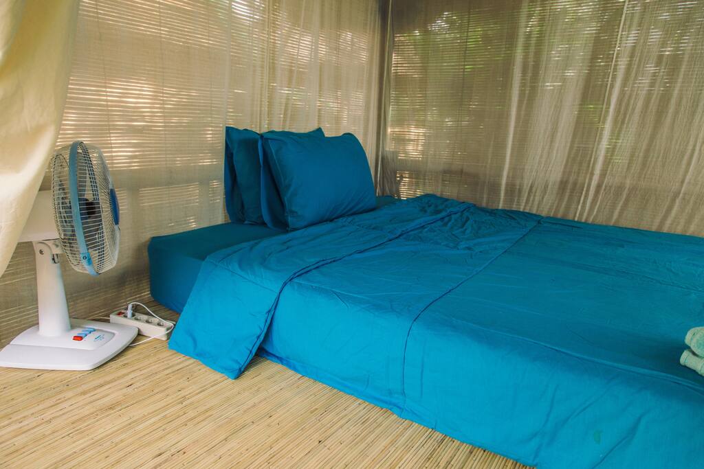 Double bed with a fan