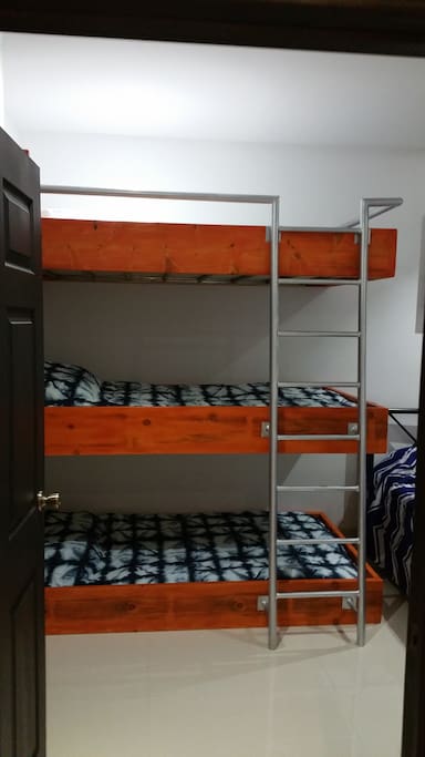 K-38 Invention Triple Single Bunk Beds for Kids or Friends. My 7 year old calls the top bunk