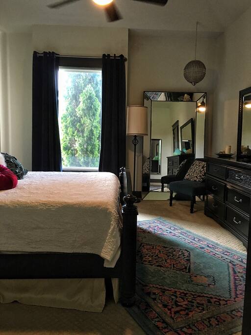 Master Bedroom Suite with walk in shower accommodates two people showering with 4 shower sprayers.