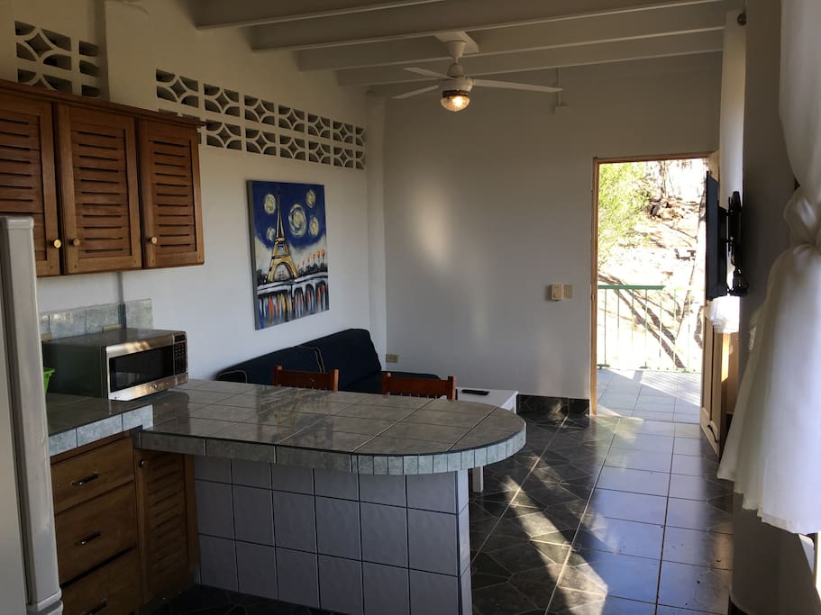 Looking towards door from the kitchen.