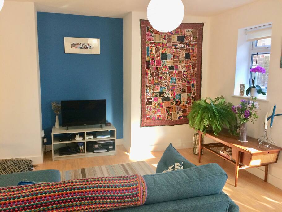 Living room with TV and Sono music system.