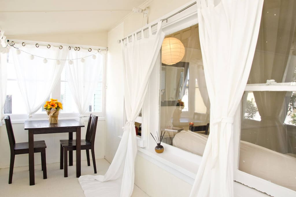 The loft showcases a table for dining with a view!