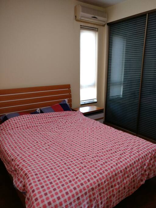 a comfy queen-sized bed and large sliding-door dresser