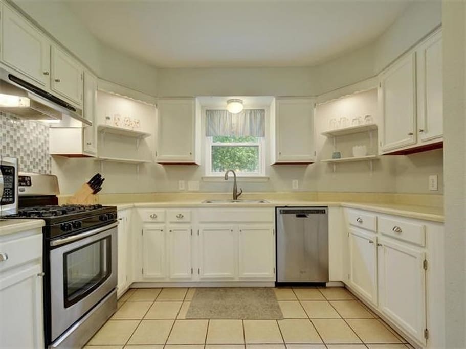 Fresh, open kitchen stocked with essentials