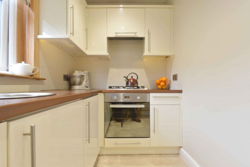 The fully fitted kitchen provides ample work space. It comes equipped with hob and built under oven as well as a microwave. Contrasting worktops add to the appeal with a breakfast bar area.