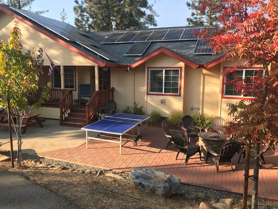 Recently installed solar panels (8.6kw). We strive to make our house as "green" as we can. Outdoor living spaces as large and nice as indoors -- landscaped front yard with ping pong table, fire pit, picnic table...