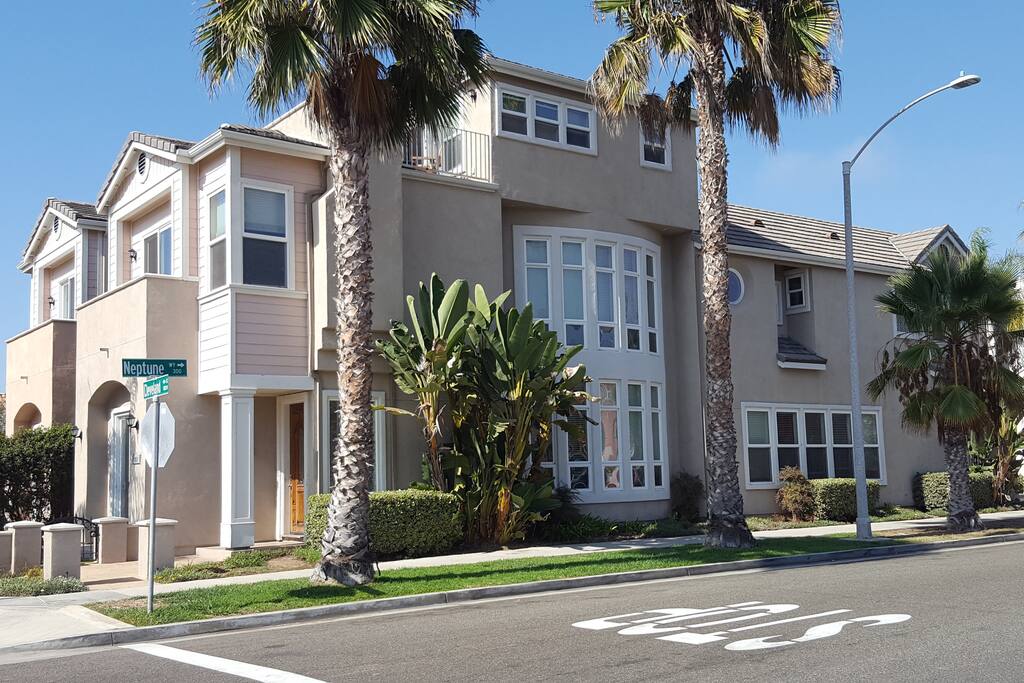 This is our other property right next door but is identical (layout is reversed, mirror image) to this house. It's hard to get a good photo of this one. This house is the one right behind the one in this image.