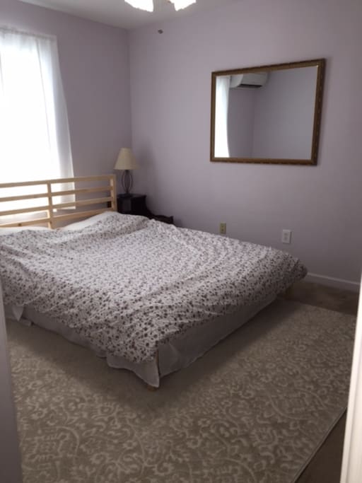Queen bed with foam mattress.