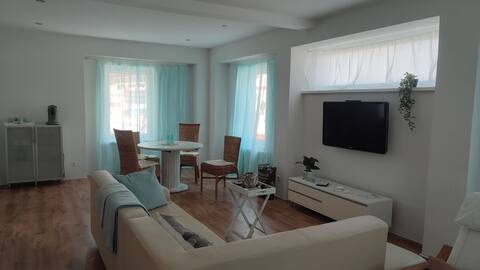 Bright apartment on the ground floor, close to nature, city, 25 km to EP