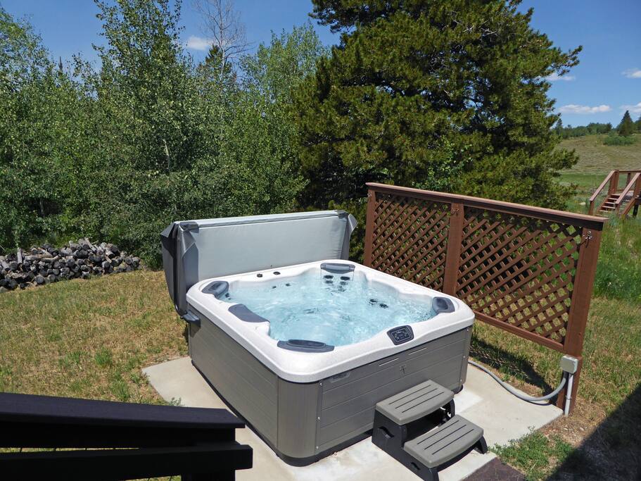 Soak in the 6 person Bullfrog hot tub!