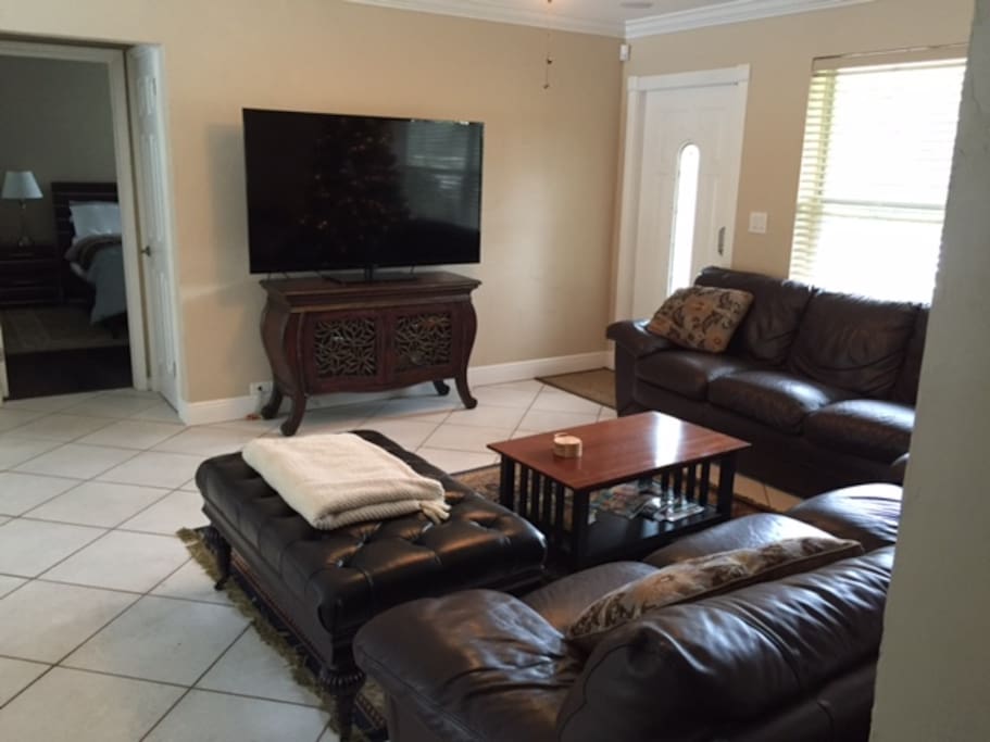 Living room with 65" flat screen TV