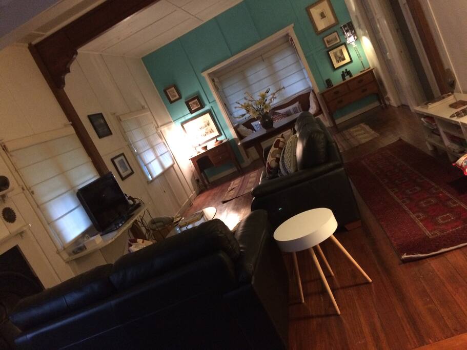 Large living space with comfortable leather setees, chromecaster for Netflix access, gas heater.