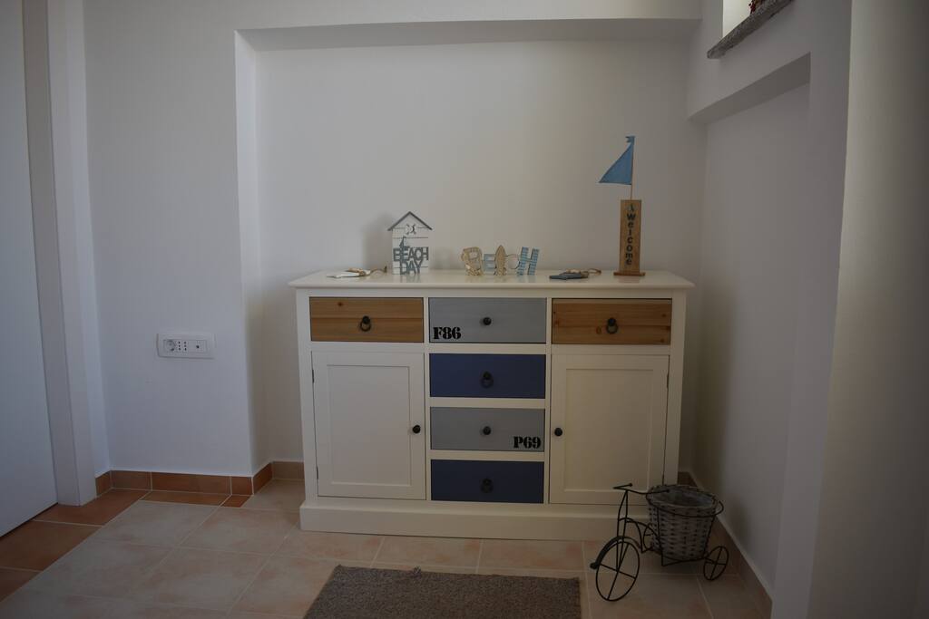 Cabinet with decorations in front of the studio entrance
