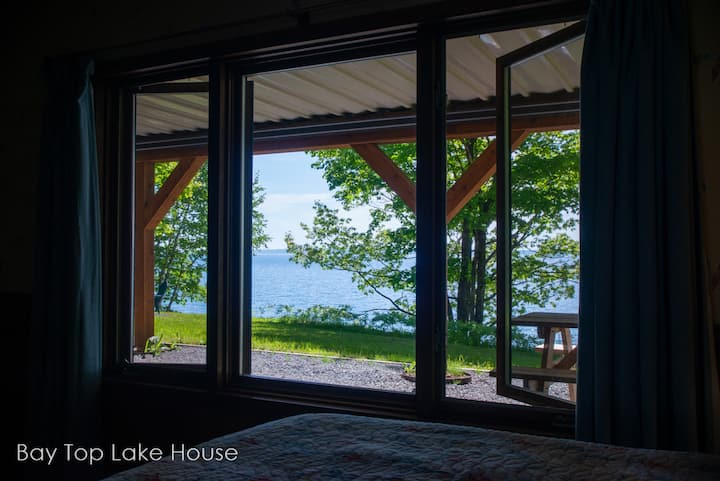 Basement queen bedroom views in summer
