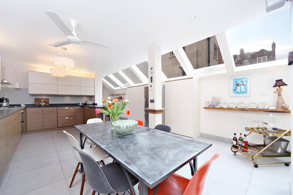 Very large, light kitchen diner with dishwasher and american fridge. Garden area.