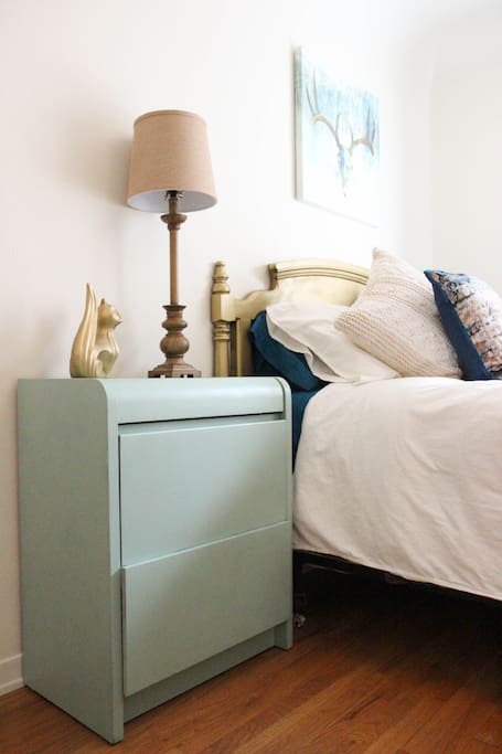 Night stand has extra drawer space and an extension cord for your cell phone.