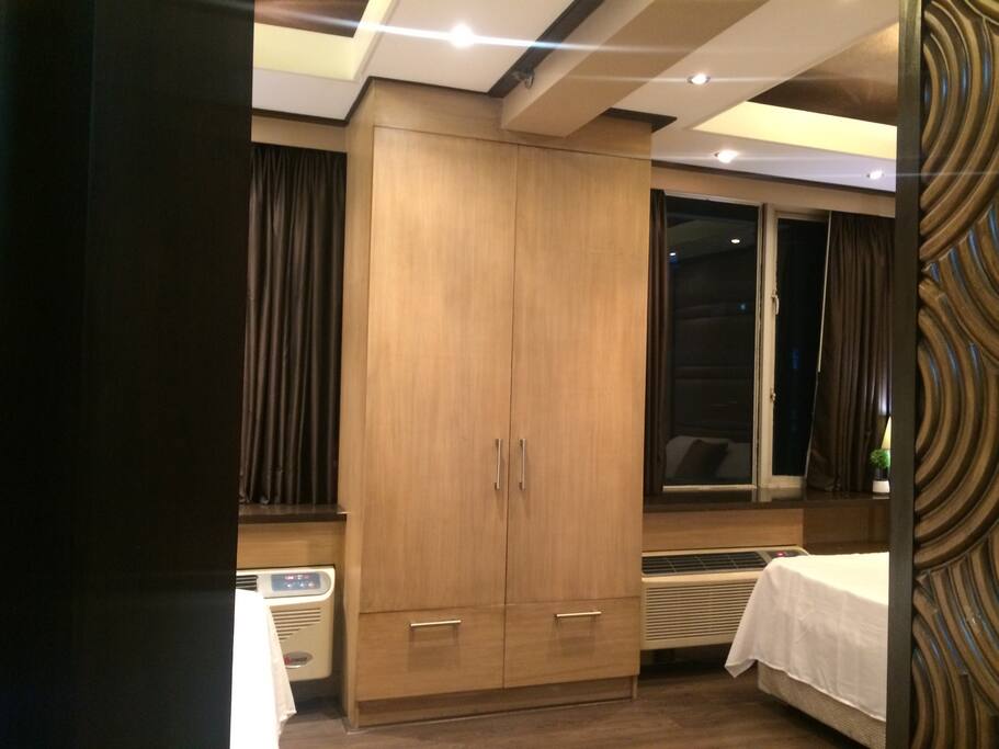 Cabinet in between bed1 and Bed2.
