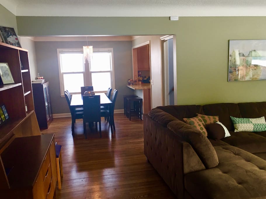 Hardwood floors throughout, cozy living room, formal dining room, and full kitchen.
