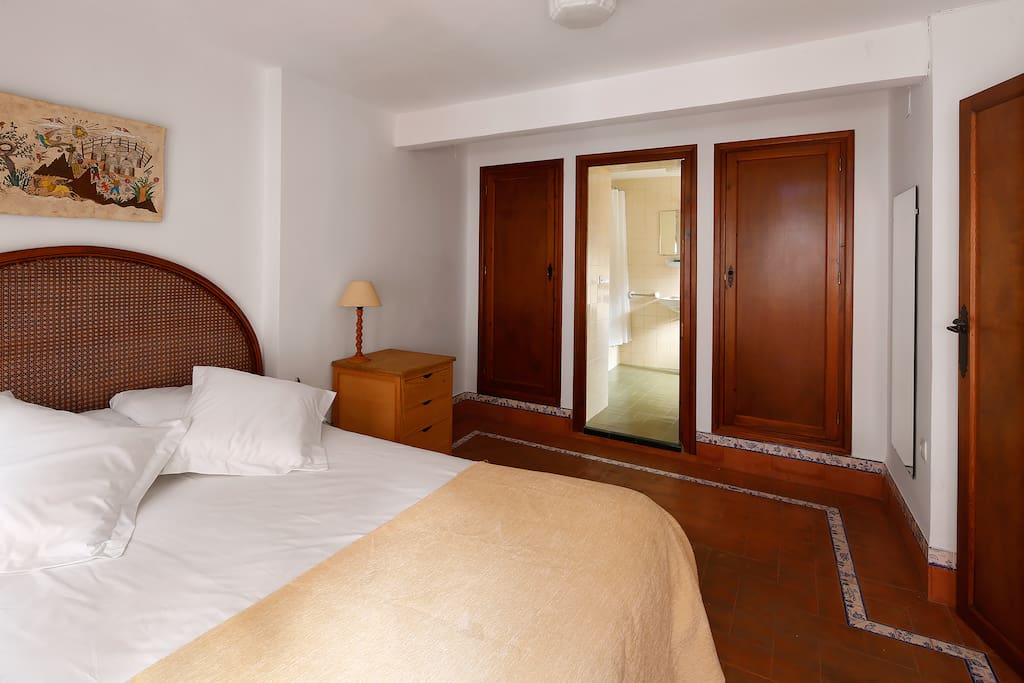 Bedroom 1 has an en-suite bathroom and fitted wardrobes.