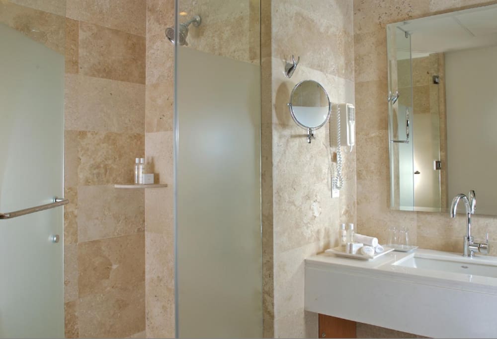 Bathroom with stand up shower.