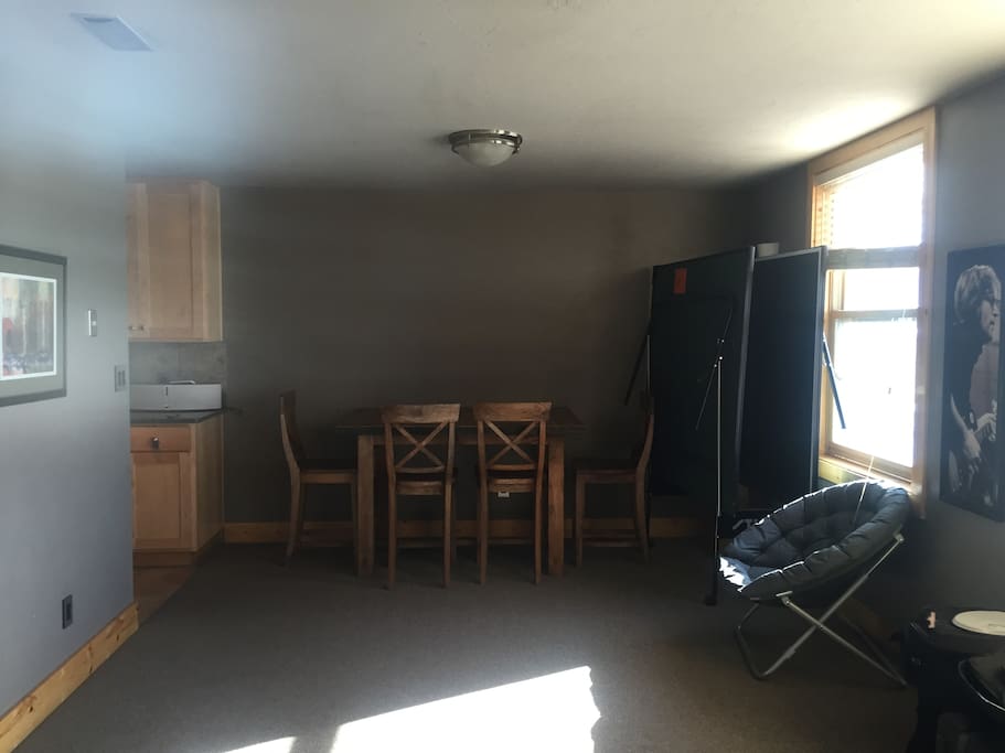 You can wheel out the ping pong table and play in the living room. There is more than enough space.